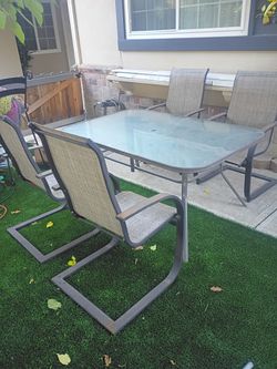 Outdoor glass table and chairs