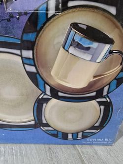 16 Piece Dinnerware Set brand new.