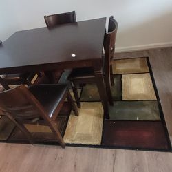 table 4 chairs and a folder and um wall sculpture for $250 