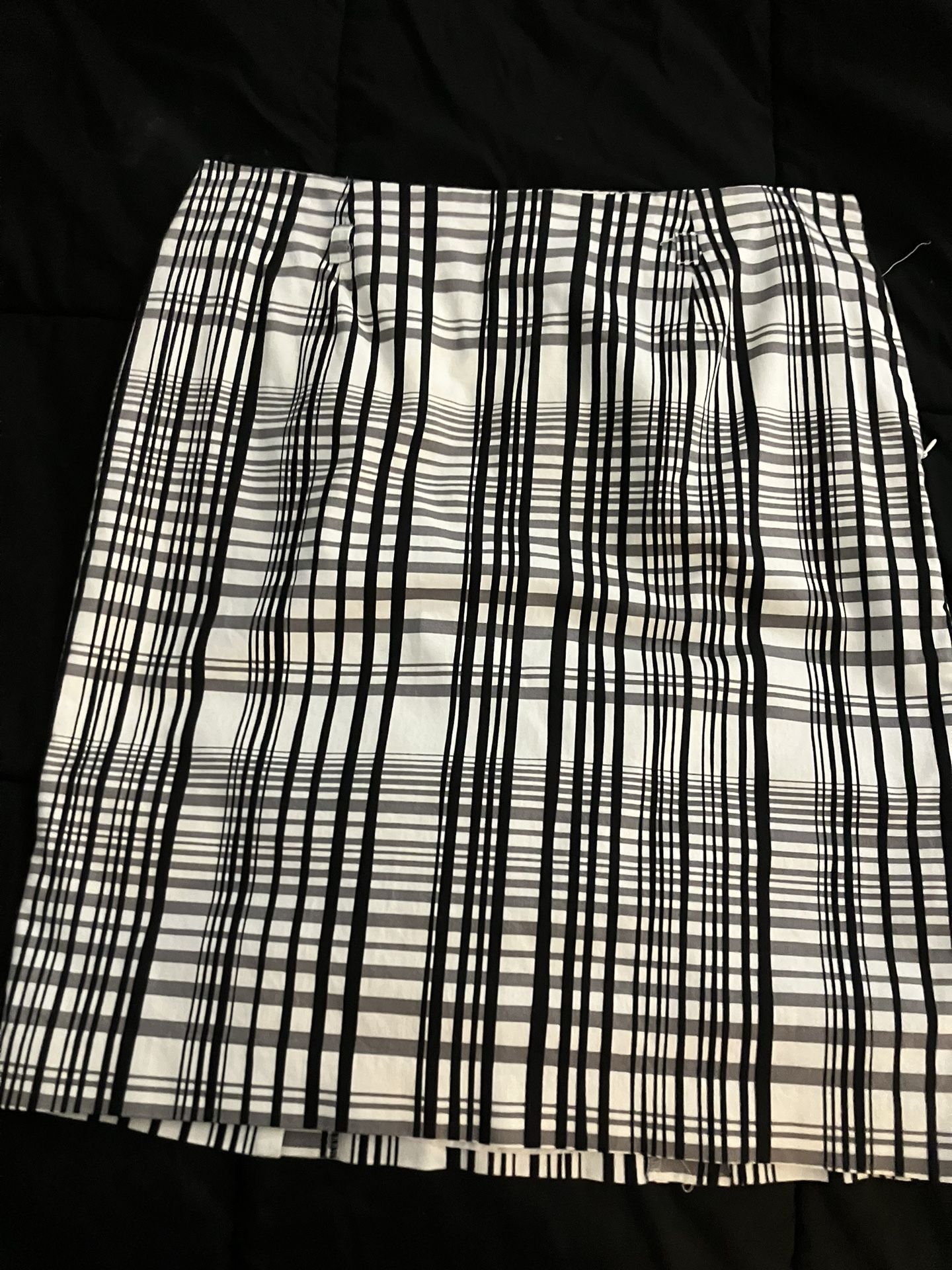 Knee length back and white plaid skirt