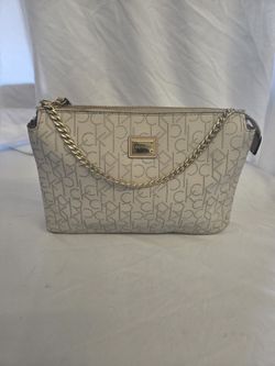 Calvin Klein Monogram Purse Bag in a Beige/White color with Gold-Plated hardware