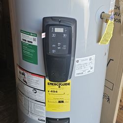 A.O. SMITH SIGNATURE ELECTRIC WATER HEATER......50 GALLON...NEW WITH A DENT ON THE TOP....$ 400