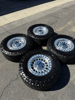KMC KM552 IMS 8x170 18" Wheels With 35” Nitto Recon Grappler Tires Machined for SuperDuty