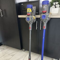 2 Dyson Vacuums 