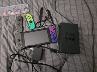 Nitendo Switch Bunfle 5 games 2 extra remotes