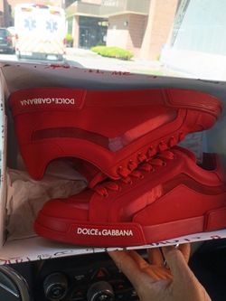 Dolce & Gabbana red low-top sneakers.