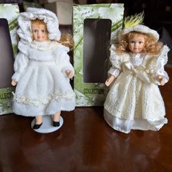Porcelain Cracker Barrel Dolls