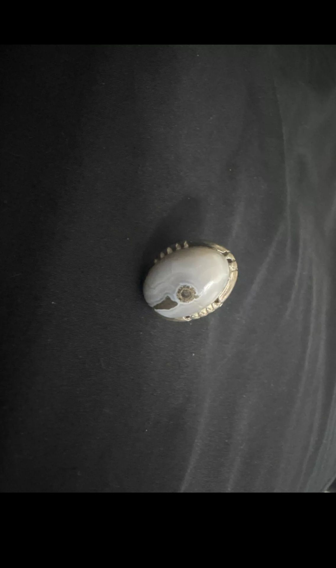 Men's silver ring a woman on an island, the only piece in the universe…