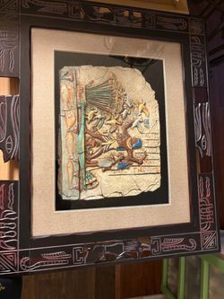 Blue and beige Egypt wall art living room.