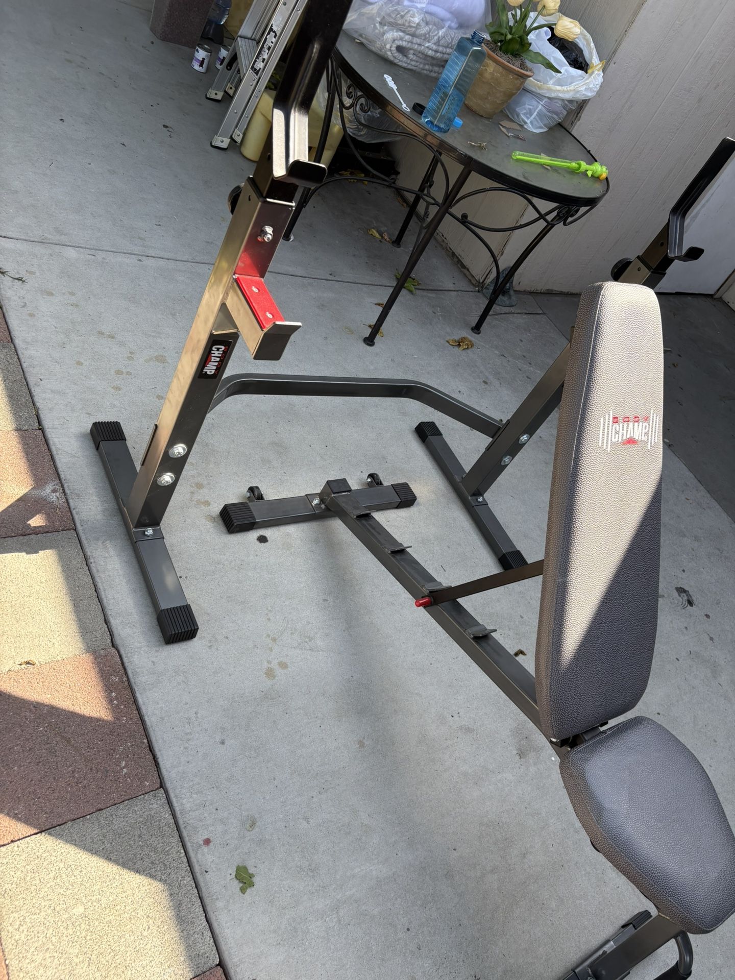 Body champ Hello Looking to get rid of this bench as soon as possible. This bench can be raised and used as an incline as well. The rack can be adju