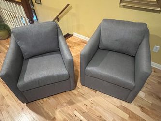 Set of 2 World Market sloped arm swivel chairs