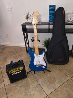 Electric guitar amplifier and guitar case