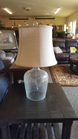 Glass table lamp with shade.