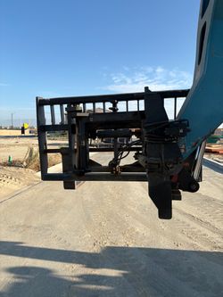 Swing carriage gradall machine