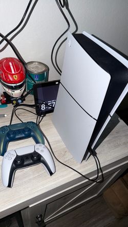 PlayStation 5 Slim Console with Two Controllers