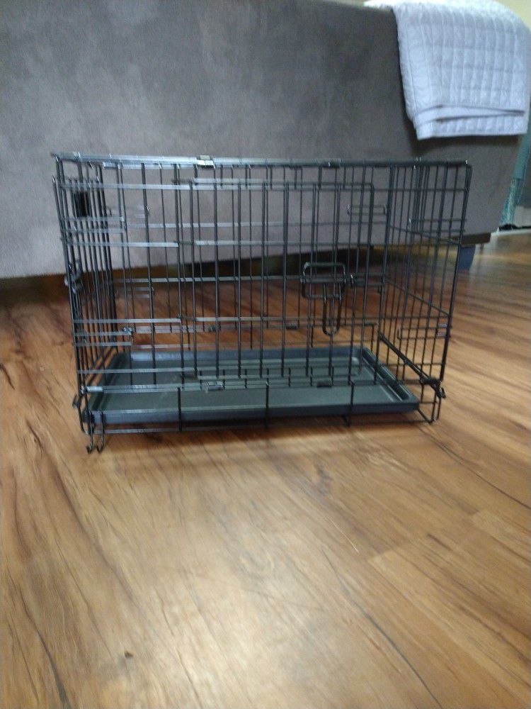 Small Dog Crate. Has Two Entrances. Used  1 Month