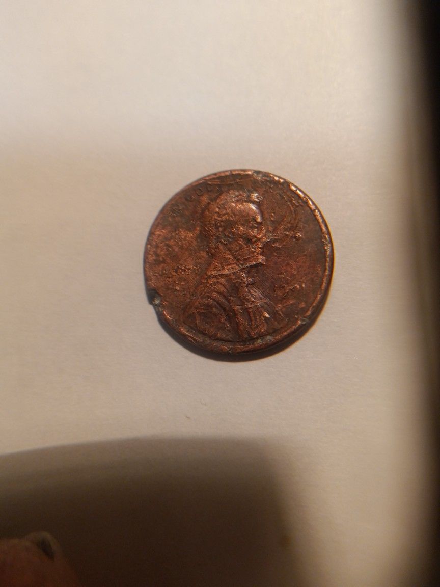 Very Rare 1991 Penny Lincoln's Chin Ear Mouth Suit, The Hole Penny Front To Back Are Errors.
