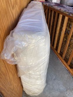 Mattress in Plastic Wrap