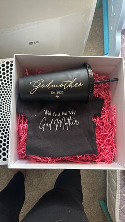Free Godmother cup and onesie cleaning closet