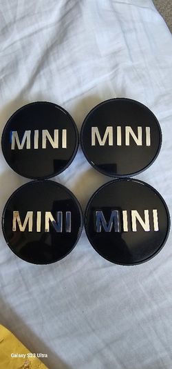 Mini OEM Center Wheel Hubs And door Lock Mini emblems!!!!