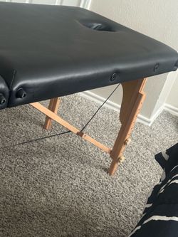 Massage table