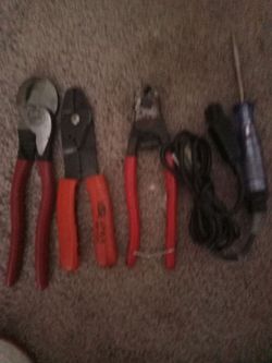 Electric Tools Wire Cutters, Wire Strippers, Light Tester.