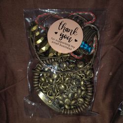 jewelry mystery bag. goldtone and metallics..