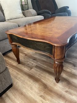 European Rococo-style cherry hardwood coffee table with a burl wood inlay from  Ethan Allen