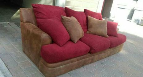 Red Sofa W/feather pillows