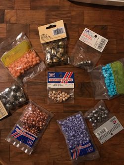 Assorted pony beads and jingle bells