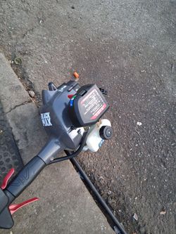 Gas powered weed eater works fine perfect