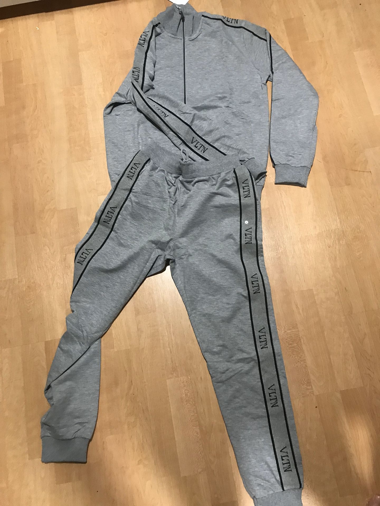 Brand new valentino tracksuit with pants and jacket