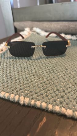 Iced out wood cartiers with dark lenses