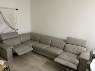 Grey leather recliner sofa. Excellent condition