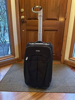 $99 OBO - TUMI Carry-On Rolling Suitcase / Luggage