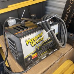 Powerwise 36 Volt EZ-GO TXT Golf Cart Battery Charger. It's designed to charge 36-volt batteries in EZ-GO golf carts and features a "D" style plug