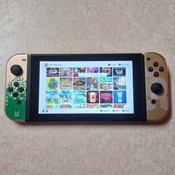 NINTENDO SWITCH LOADED with 125 SWITCH GAMES and 7500 RETRO GAMES