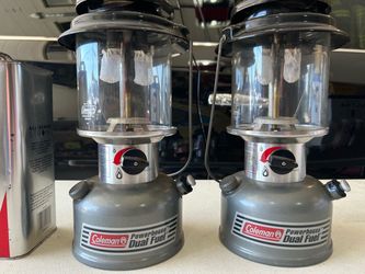 Two Coleman powerhouse, Duel fuel, camping lanterns, and a gallon of camp fuel Two Coleman powerhouse, Duel fuel, camping lanterns, and a gallon of ca