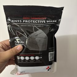 10-pack of black Medic Therapeutics KN95 protective masks designed for particulate filtration