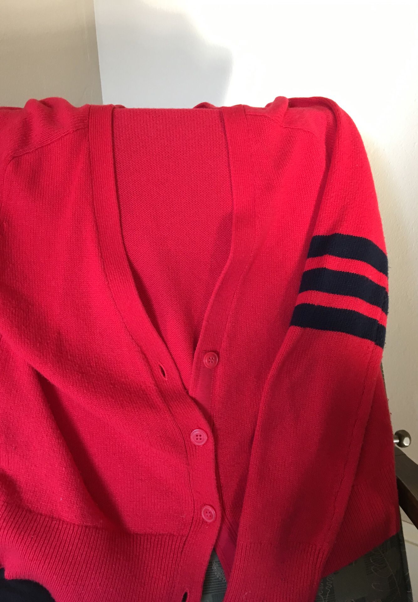 Red cardigan (size M) with varsity stripes on sleeves. Cute!