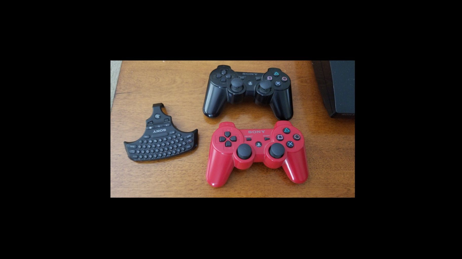 PS3 slim w/2 controllers/accessories/9 games