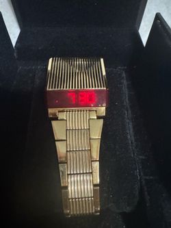 Bulova digital  computron watch in gold and red