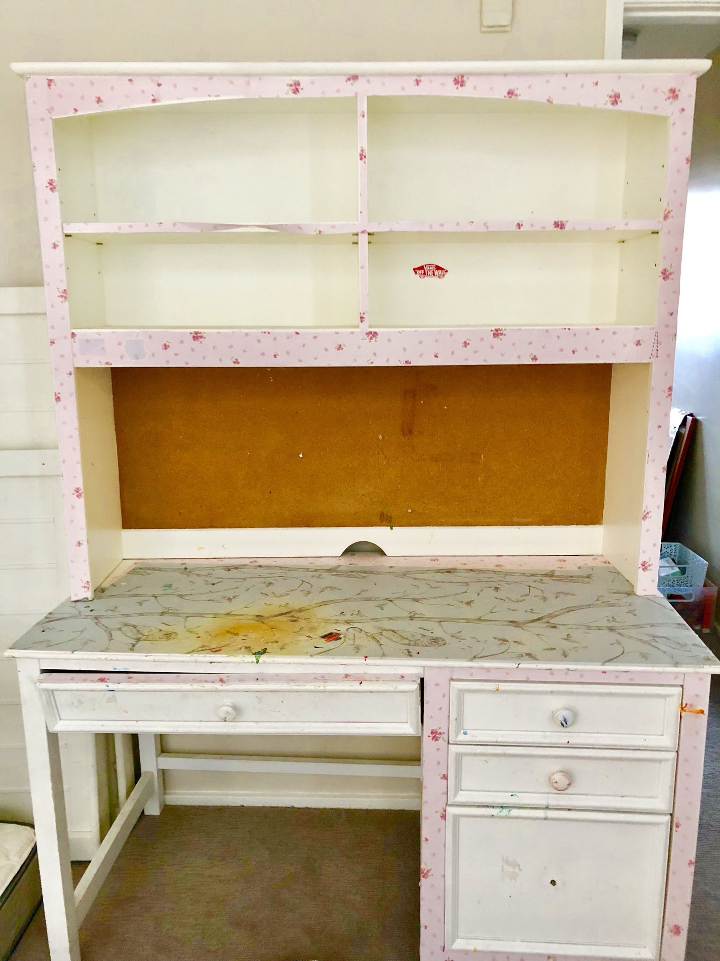 White desk with four drawers and bookshelf