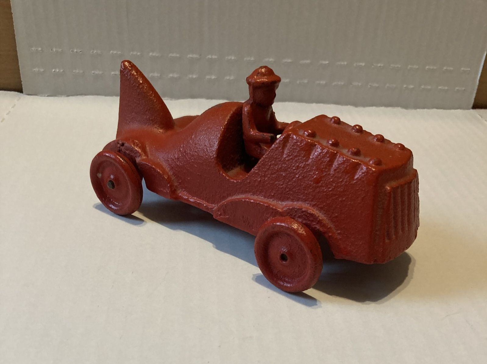 Vintage cast iron toy cars Poss. A Hubley cast iron Red race car with driver 6”