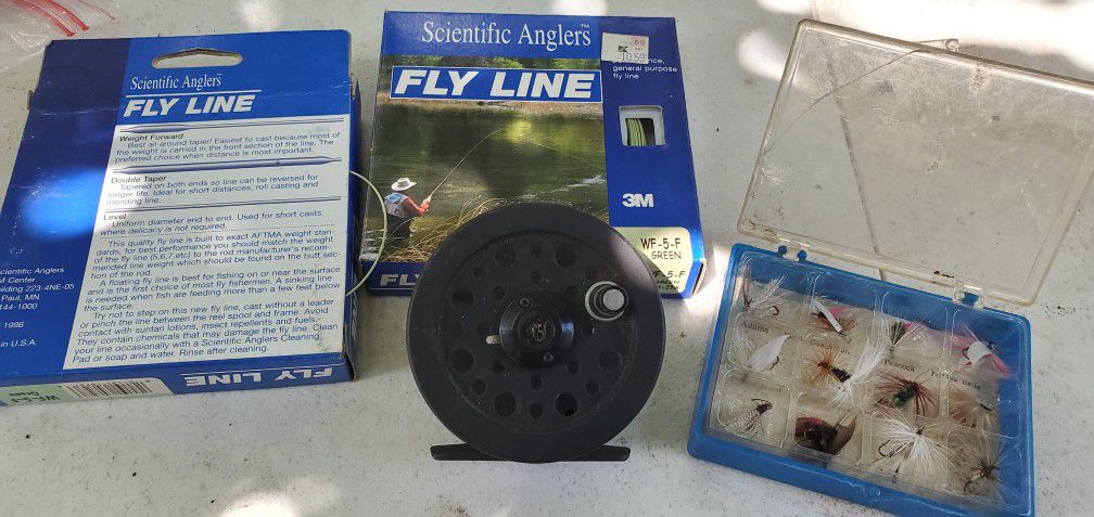 Fly fishing reel and tackle.