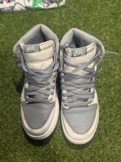 Grey/white Jordan 1s
