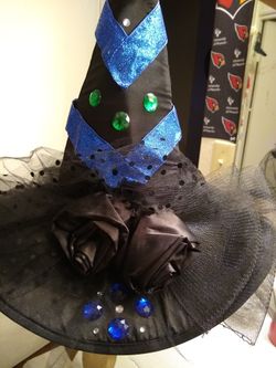 Halloween witch or wizard hat, comes with a green spider clip on and a bat clip on. Optional. just need to get rid of it. $8 or make me an offer.