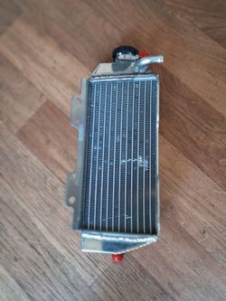 2 MOTORCYCLE RADIATOR!! 75$ NEW