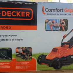 New Black and Decker 10 AM 15 inch Corded lawn mower.