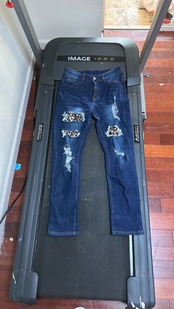 Cute stretchy leopard print patchy jeans size Large